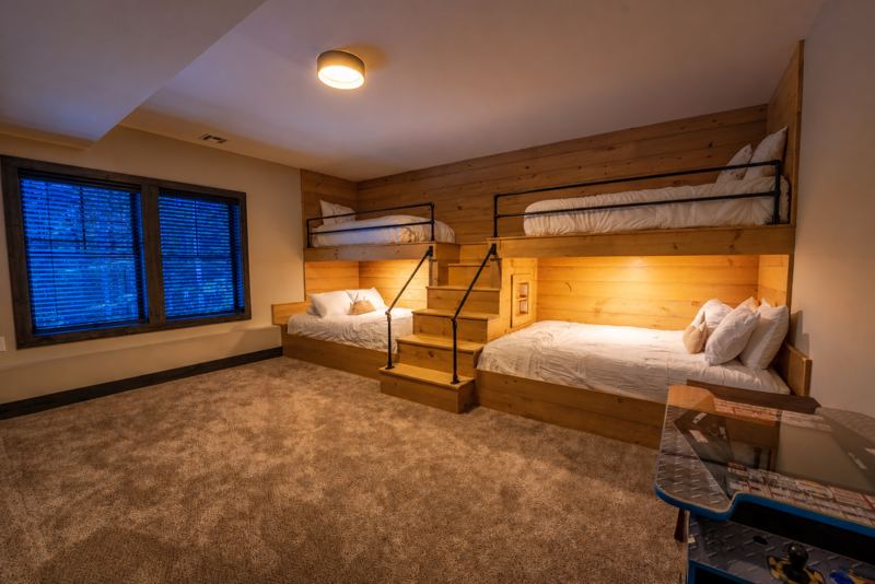 Bunk room with lofted beds